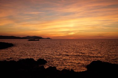 Menorca 'da turuncu gün batımı.