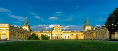 Warsav, mazowieckie / poland - July 3 2022: Wilanow Palace - a baroque royal palace located in Warsaw, in the Wilanow district, sunny day view of the building with the surrounding greenery.