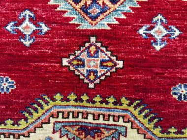 Kırmızı halı deseni arka plan dokusu kadar güzel.