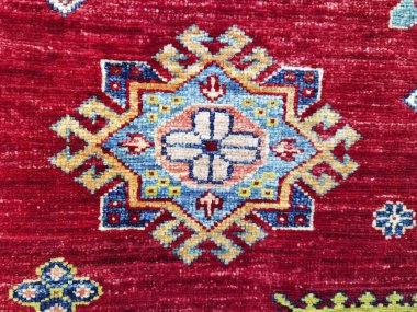 Kırmızı halı deseni arka plan dokusu kadar güzel.