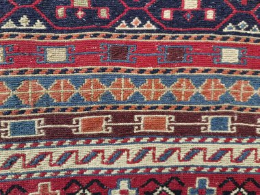 Kırmızı halı deseni arka plan dokusu kadar güzel.