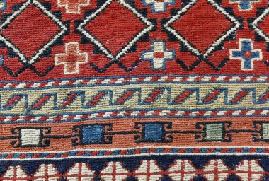 Kırmızı halı deseni arka plan dokusu kadar güzel.