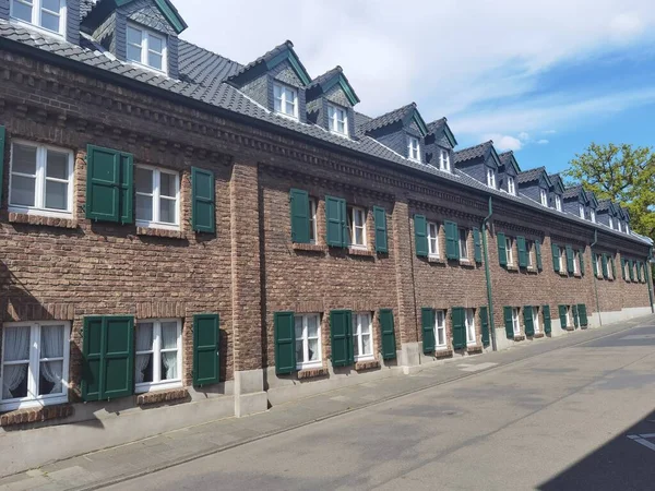 Very Nice Brick Townhouses Green Sunshades Windows — стоковое фото