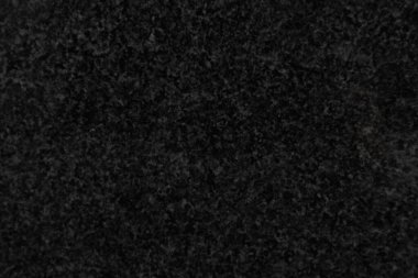 Mermer bir levhanın dokusundan siyah bir arkaplan..