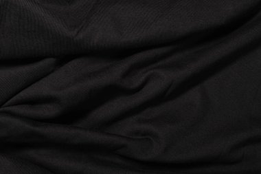 Siyah kumaştan yapılmış koyu dalgalı arkaplan.