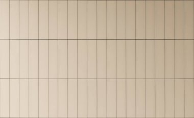 Dikey çizgileri olan bej uzun fayansların arkaplanı.