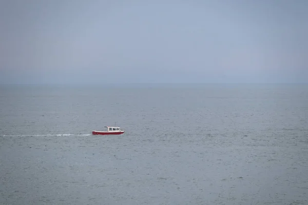 Small Red Fishing Boat Sea Foggy Sea Cloudy Weather Shortly —  Fotos de Stock