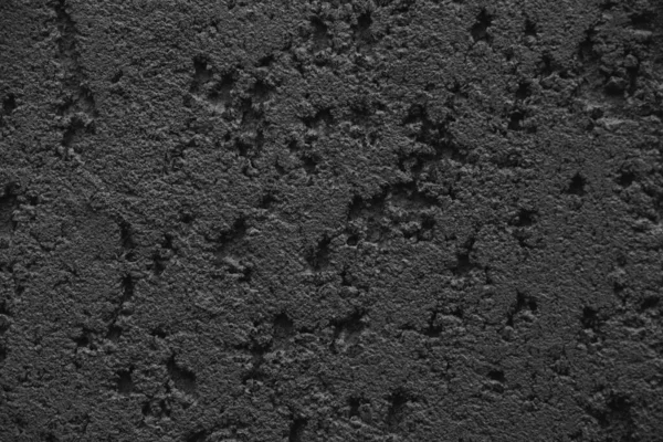 Siyah Pürüzlü Doku Alçı Desenli Koyu Bir Arka Plan — Stok fotoğraf