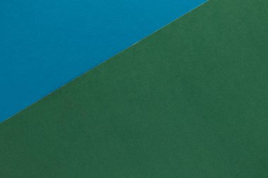 Mavi ve yeşil renkli iki renkli kağıt dokusu.