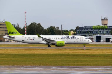 AirBaltic airline Airbus A220-300 on the runway at Riga International Airport. Riga International Airport, Marupe, Latvia - 08 Jul 2022.