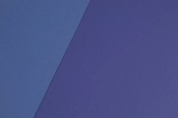 Blue color background from paper texture. Two tone background with paper pattern.