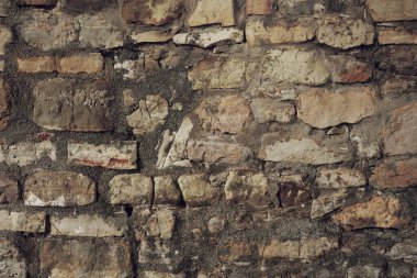 Stone background from the wall of an ancient building. Stone texture background.