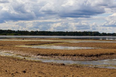 Decrease in the water level in the river during a period of great drought.