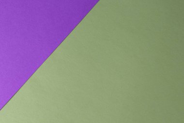 Two color, violet and green, textured paper background.