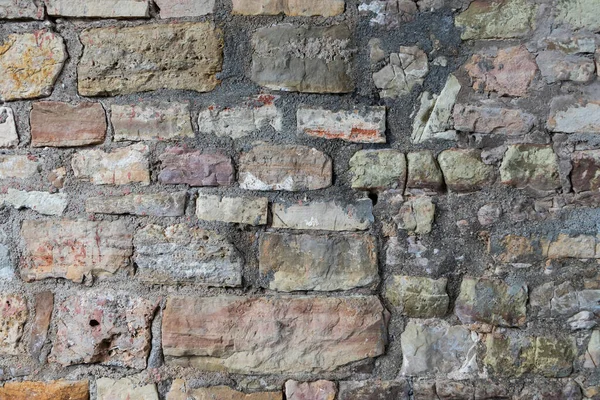 Background from an old stone masonry wall. Stone masonry pattern.