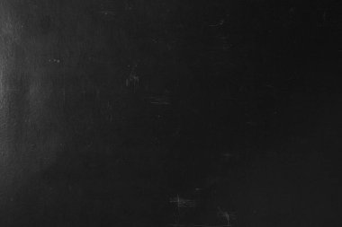 Old black paper background. Background with scratched paper pattern.