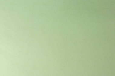 Light green paper texture. Blank background of green colored paper.