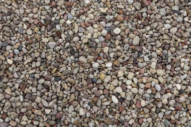 Natural background of round stones texture pattern. Stone pattern.