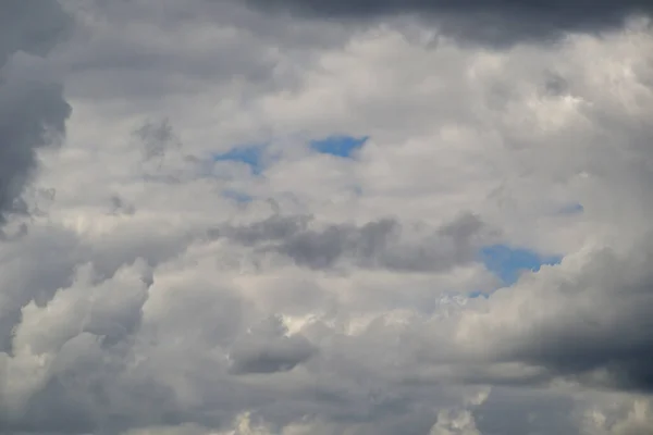 Background with big white clouds. Clouds background.