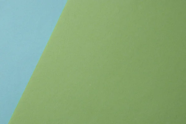 Two color light blue and light green paper texture background in pastel colors.