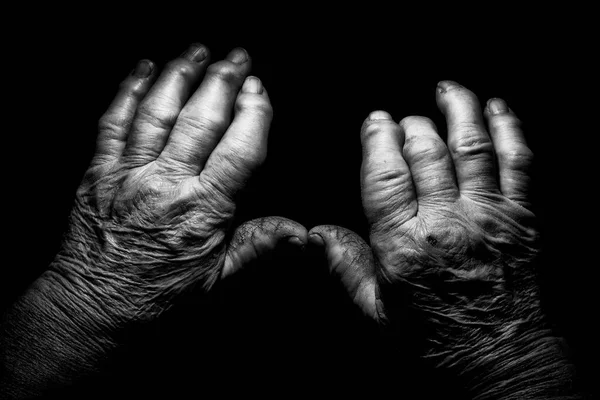 Old Black White Photo Hand Man Dark Background — Stockfoto