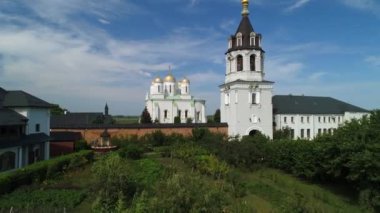 Svyatogorsky Assumption Zymna Stauropean Monastery. Aerial view around the gilded domes of the church. Aerial view Village Zymne.