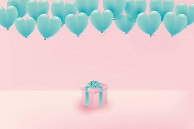 Pastel renkli kalp balonları ve hediye paketi.