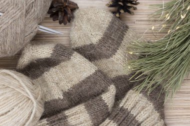 Cozy knitted socks and skeins.