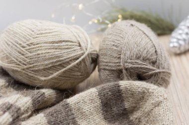 Cozy knitted socks and skeins.