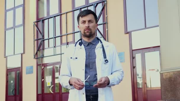 Portrait Young Male Doctor White Lab Coat Stethoscope Wearing Eyeglasses — Stock video
