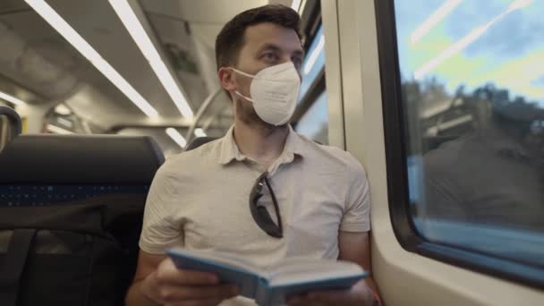 Commuter Wearing Protective Mask Reads Book Train Trip Germany While — Stok video