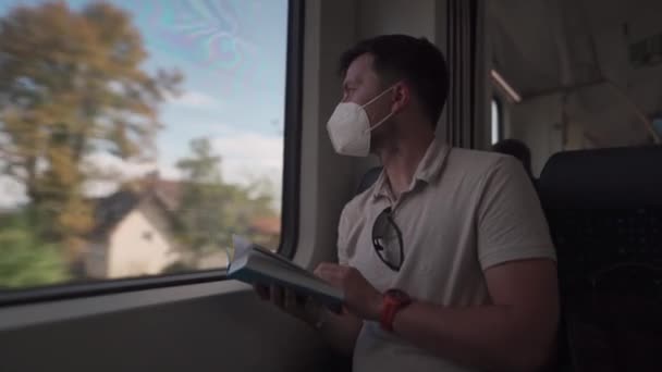 Commuter Wearing Protective Mask Reads Book Train Trip Germany While — Wideo stockowe