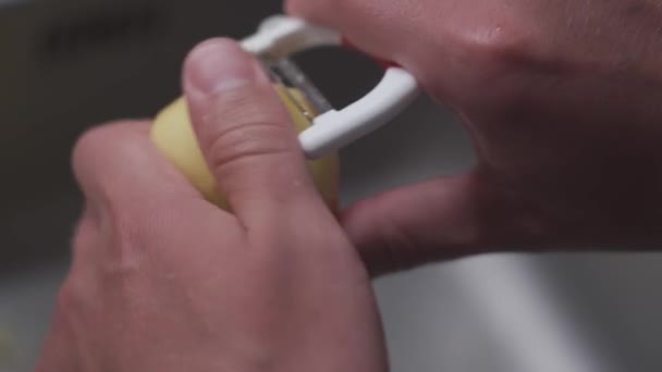 Husband Peels Potatoes Tool Cleaning Vegetables Making Dinner Health Food — Videoclip de stoc