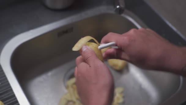Husband Peels Potatoes Tool Cleaning Vegetables Making Dinner Health Food — 图库视频影像