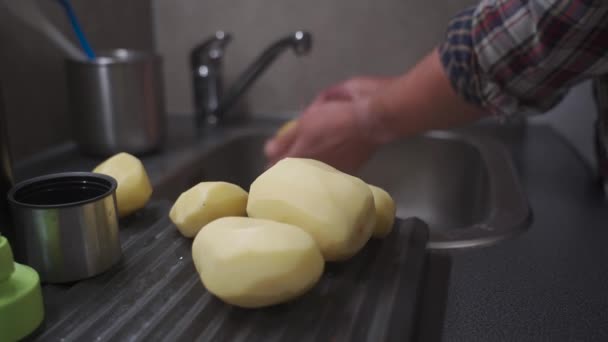 Husband Peels Potatoes Tool Cleaning Vegetables Making Dinner Health Food — Stock Video