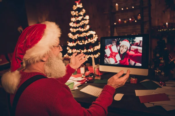 Profile side photo of aged santa claus happy positive smile conversation video call computer online wish happy new year indoors — Stock Photo, Image