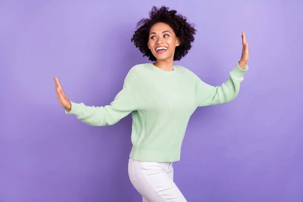 Photo of happy funky dark skin positive woman look empty space dance enjoy isolated on violet color background — Stock Photo, Image