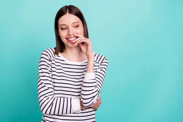 Photo of cheerful flirty lady hand chin look empty space wear striped shirt isolated on turquoise color background — Stock Photo, Image