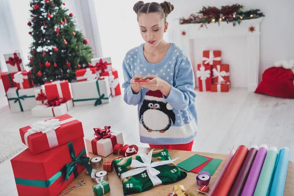 Portrait of attractive focused girl making craft work blogging photographing preparing gift at home indoors — Stock Photo, Image