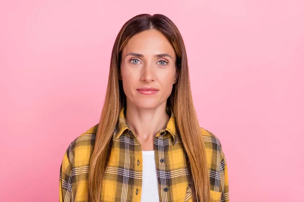 Photo of calm satisfied person look camera wear checkered isolated on bright pink color background