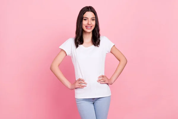 Photo of charming happy positive woman hold hands waist good mood smile isolated on pink color background — Stock Photo, Image