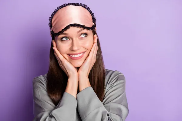 Close-up portrait of attractive minded cheerful girl wearing pajama thinking copy space isolated over violet purple color background — Stock Photo, Image