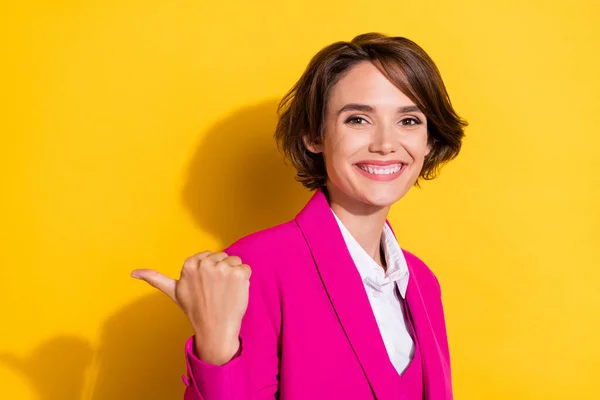 Profile photo of nice young brunette lady point empty space wear pink blazer isolated on yellow color background — Stock Photo, Image