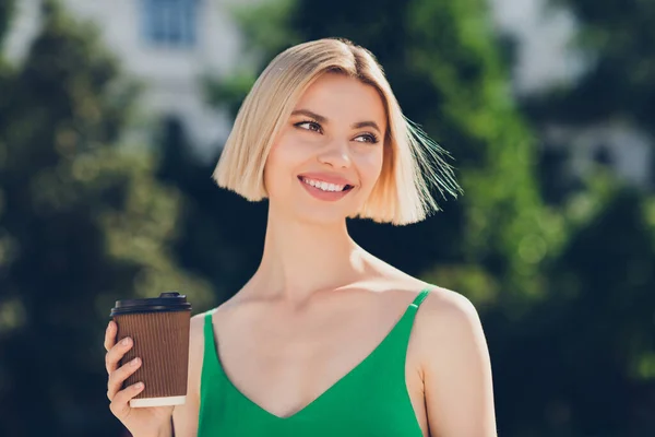 Photo of carefree positive businesswoman have coffee break drink latte wear green dress urban city outside — Stock Photo, Image