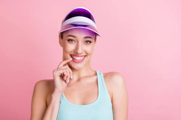 Portrait of attractive cheerful feminine girl posing biting nail good mood isolated over pink pastel color background — Stock Photo, Image
