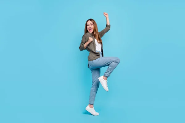 Full size photo of positive mature woman winner lucky victory good mood smile isolated on blue color background — Stockfoto