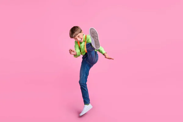 Full length body size view of attractive trendy funky boy jumping fooling fighting isolated over pink pastel color background — Stock Photo, Image