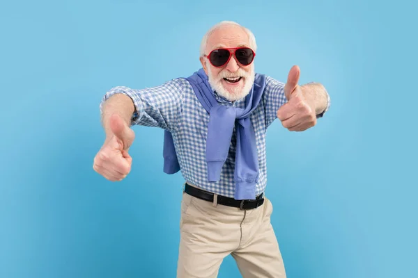 Photo of optimistic old grey hairdo man dance wear spectacles blue shirt isolated on color background