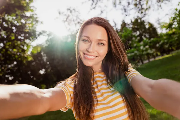 Self-portrait of attractive carefree cheerful girl enjoying holiday harmony idyllic time daydream outdoors