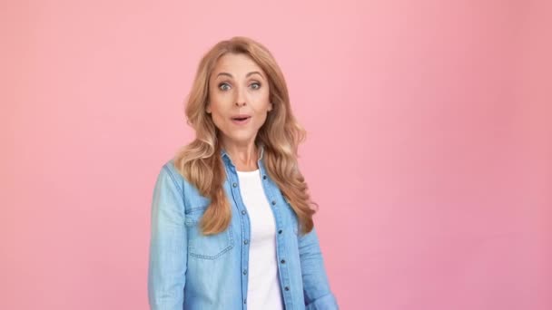 Cheerful astonished lady raise fists celebrate victory — Stock Video